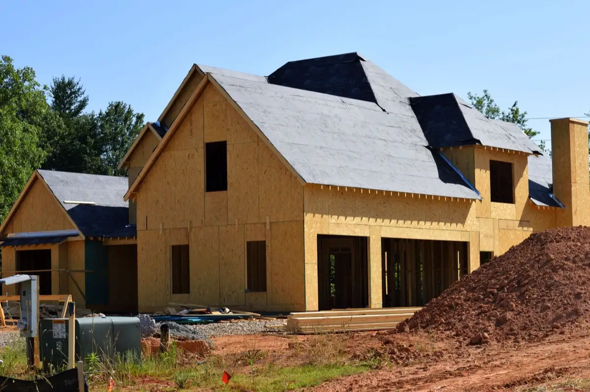 House with new roof decking and synthetic underlayment during a roof replacement in Alpharetta, GA